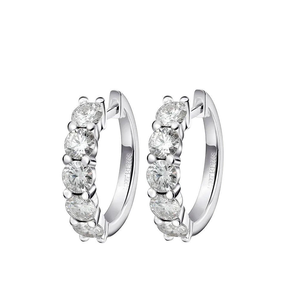 Round moissanite loop dangle earrings from Bee-Bees featuring sparkling round-cut stones.