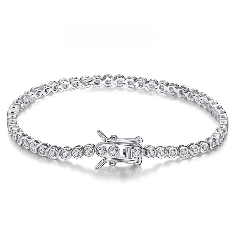 Elegant silver moissanite tennis bracelet featuring round brilliant-cut stones in bezel settings, a secure clasp, and a polished finish on a clean white background.