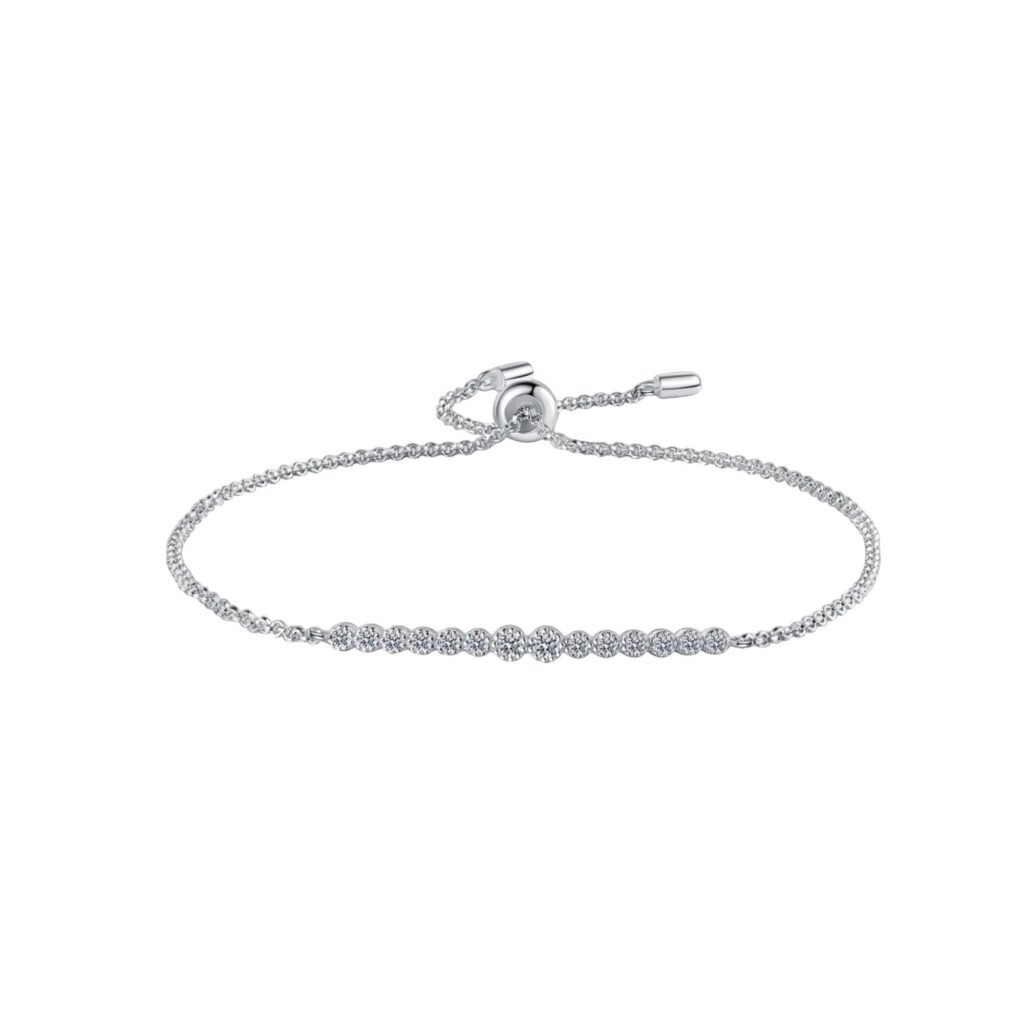 Elegant adjustable moissanite bolo bracelet featuring a row of sparkling round-cut stones, a delicate polished silver chain, and a sliding clasp, displayed on a clean white background.