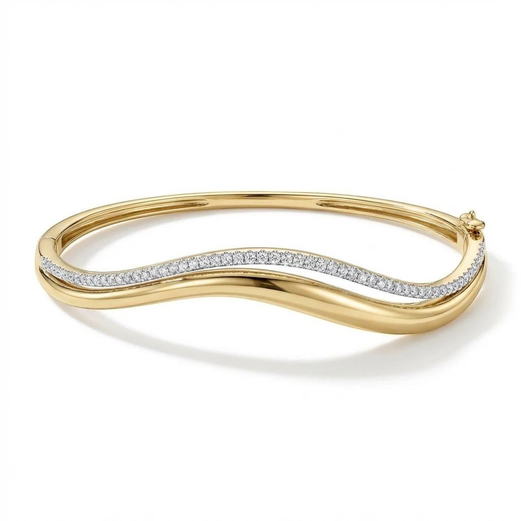 Elegant gold-tone moissanite bangle bracelet featuring a flowing wave design, sparkling pavé-set stones, a polished finish, and a hinged clasp, displayed on a clean white background.